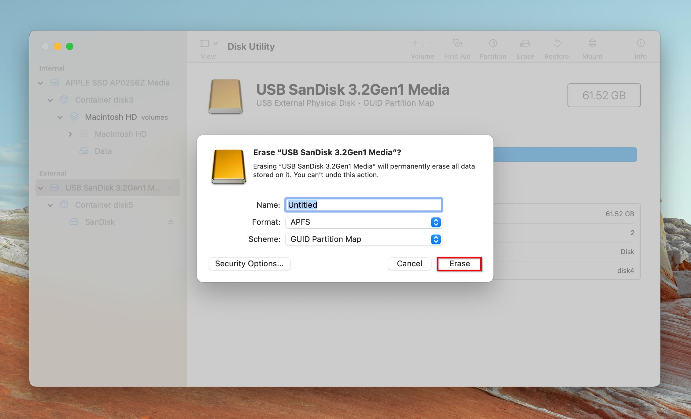 Disk Utility on macOS displaying the "Erase USB SanDisk 3.2Gen1 Media" confirmation dialog with the "Erase" button highlighted.